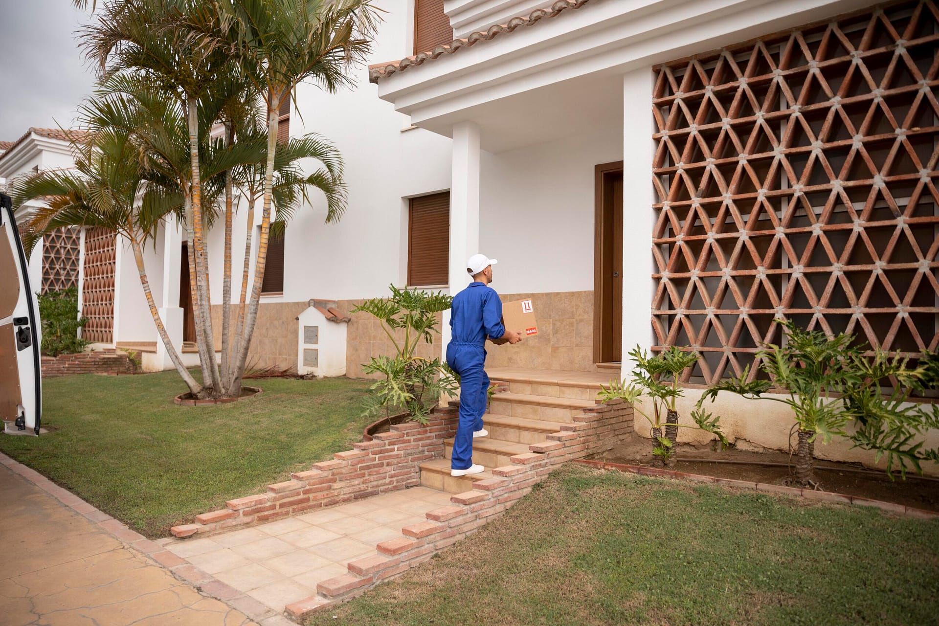 Pest Control 1 long shot delivery man holding box scaled